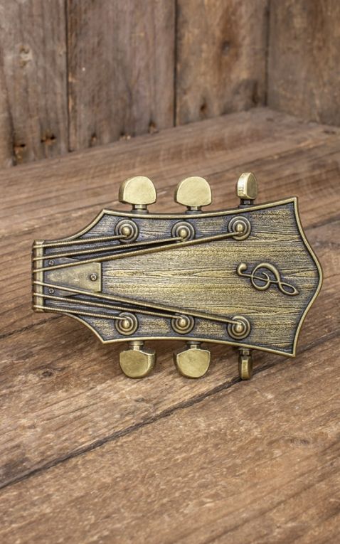 Buckle Guitar head with clef
